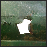 Dumpster holes repaired